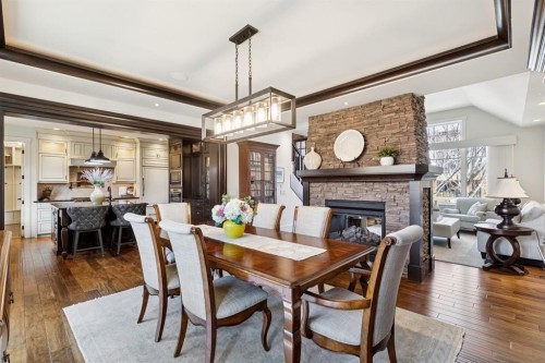 4315 17 Street Sw, Calgary, AB - Indoor Photo Showing Dining Room With Fireplace