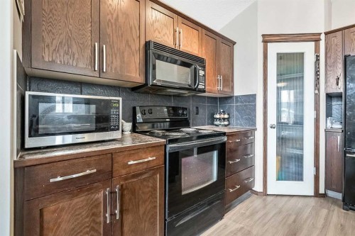 59 Cranberry Place Se, Calgary, AB - Indoor Photo Showing Kitchen