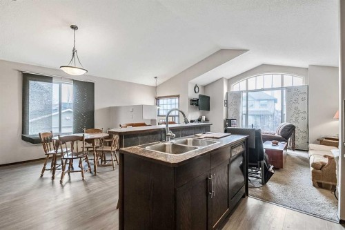 59 Cranberry Place Se, Calgary, AB - Indoor Photo Showing Kitchen With Double Sink