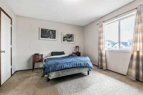 59 Cranberry Place Se, Calgary, AB - Indoor Photo Showing Bedroom