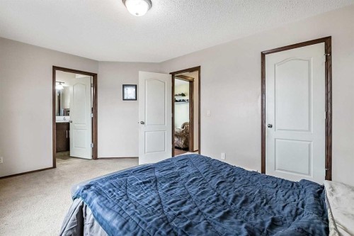 59 Cranberry Place Se, Calgary, AB - Indoor Photo Showing Bedroom