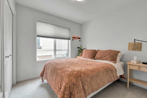 898 Sherwood Boulevard Nw, Calgary, AB - Indoor Photo Showing Bedroom