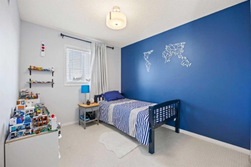 371 Silverado Drive Sw, Calgary, AB - Indoor Photo Showing Bedroom
