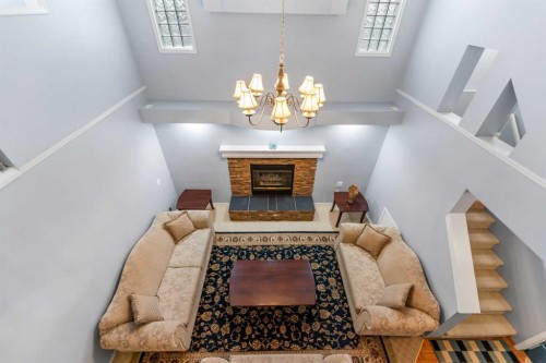 14950 Mt Mckenzie Drive Se, Calgary, AB - Indoor With Fireplace