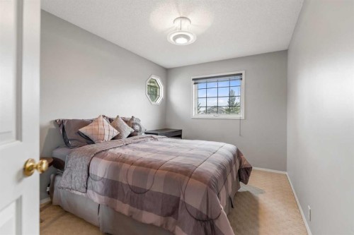 14950 Mt Mckenzie Drive Se, Calgary, AB - Indoor Photo Showing Bedroom