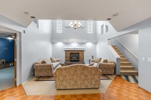 14950 Mt Mckenzie Drive Se, Calgary, AB - Indoor With Fireplace