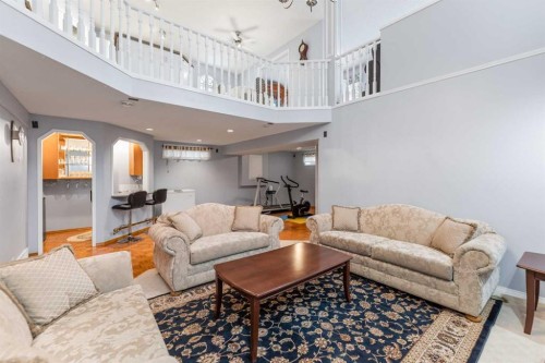 14950 Mt Mckenzie Drive Se, Calgary, AB - Indoor Photo Showing Living Room
