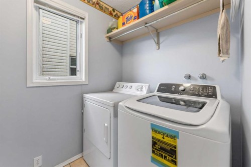 14950 Mt Mckenzie Drive Se, Calgary, AB - Indoor Photo Showing Laundry Room