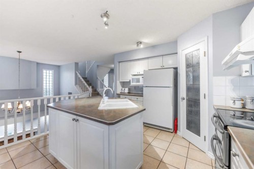 14950 Mt Mckenzie Drive Se, Calgary, AB - Indoor Photo Showing Kitchen