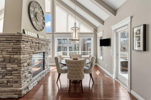 89 Ascot Crescent Sw, Calgary, AB - Indoor Photo Showing Dining Room With Fireplace