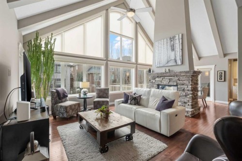 89 Ascot Crescent Sw, Calgary, AB - Indoor Photo Showing Living Room With Fireplace