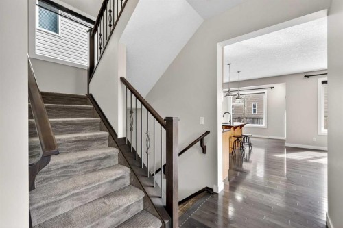 31 Evansridge Close Nw, Calgary, AB - Indoor Photo Showing Living Room With Fireplace