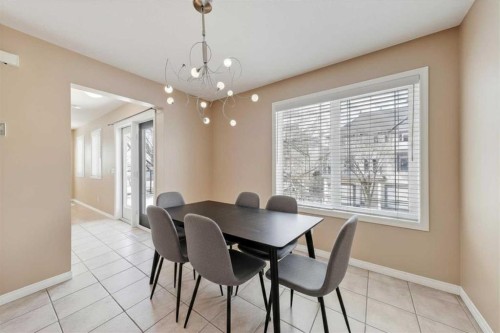 40 Simcoe Place Sw, Calgary, AB - Indoor Photo Showing Dining Room