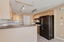 40 Simcoe Place Sw, Calgary, AB  - Indoor Photo Showing Kitchen 