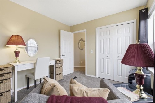 44 Cimarron Grove Way, Okotoks, AB - Indoor Photo Showing Bedroom