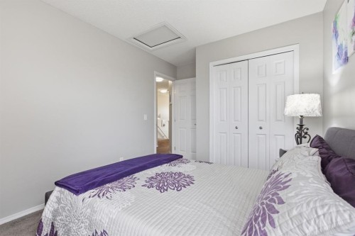44 Cimarron Grove Way, Okotoks, AB - Indoor Photo Showing Bedroom