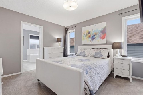 44 Cimarron Grove Way, Okotoks, AB - Indoor Photo Showing Bedroom