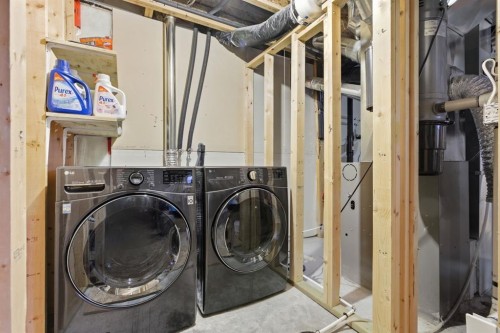 44 Cimarron Grove Way, Okotoks, AB - Indoor Photo Showing Laundry Room