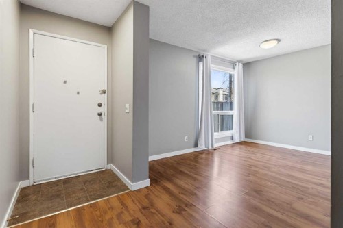 141-6915 Ranchview Drive Nw, Calgary, AB - Indoor Photo Showing Other Room