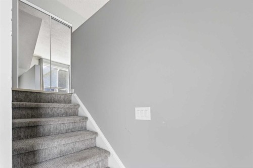 141-6915 Ranchview Drive Nw, Calgary, AB - Indoor Photo Showing Other Room