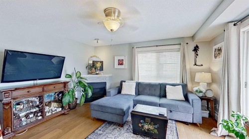 3312-279 Copperpond Common Se, Calgary, AB - Indoor Photo Showing Living Room