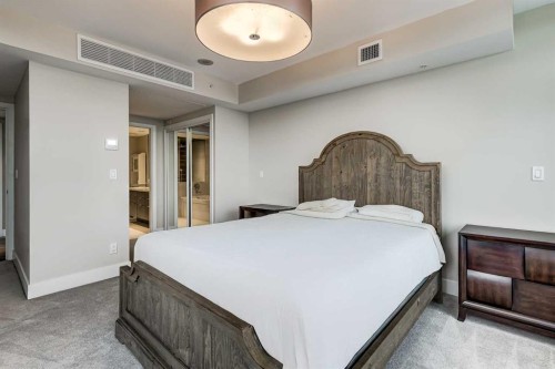 1802-519 Riverfront Avenue Se, Calgary, AB - Indoor Photo Showing Bedroom