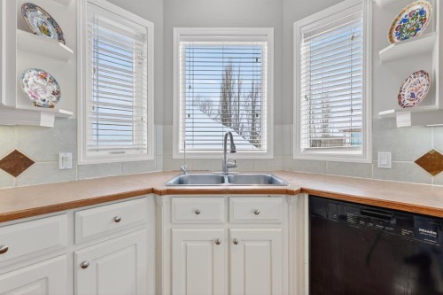 331 Mt Douglas Court Se, Calgary, AB - Indoor Photo Showing Kitchen With Double Sink