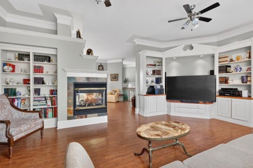 331 Mt Douglas Court Se, Calgary, AB - Indoor Photo Showing Living Room With Fireplace