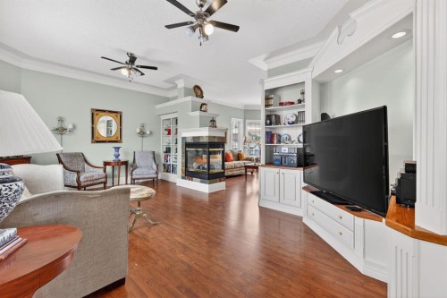 331 Mt Douglas Court Se, Calgary, AB - Indoor Photo Showing Living Room With Fireplace