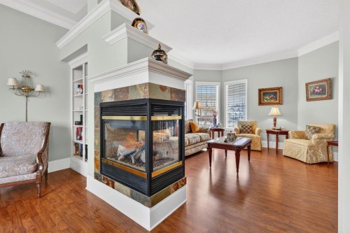 331 Mt Douglas Court Se, Calgary, AB - Indoor Photo Showing Living Room With Fireplace