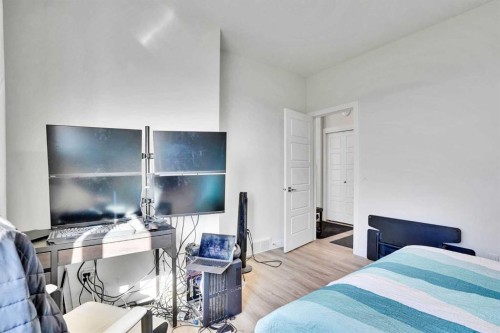 183 Brander Avenue, Langdon, AB - Indoor Photo Showing Bedroom