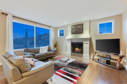 33 Quarry Heights Se, Calgary, AB - Indoor Photo Showing Living Room With Fireplace