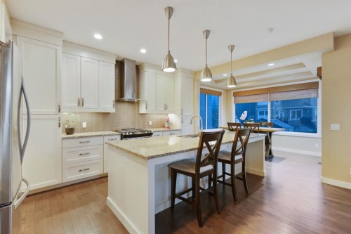 33 Quarry Heights Se, Calgary, AB - Indoor Photo Showing Kitchen With Upgraded Kitchen