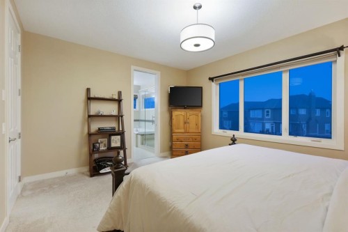 33 Quarry Heights Se, Calgary, AB - Indoor Photo Showing Bedroom
