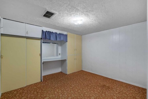 212 Westwood Drive Sw, Calgary, AB - Indoor Photo Showing Other Room