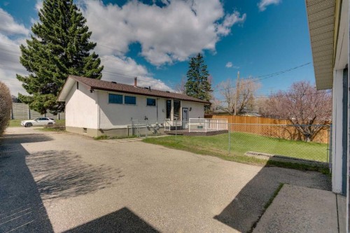 212 Westwood Drive Sw, Calgary, AB - Outdoor With Deck Patio Veranda