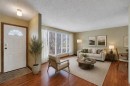 212 Westwood Drive Sw, Calgary, AB  - Indoor Photo Showing Living Room 