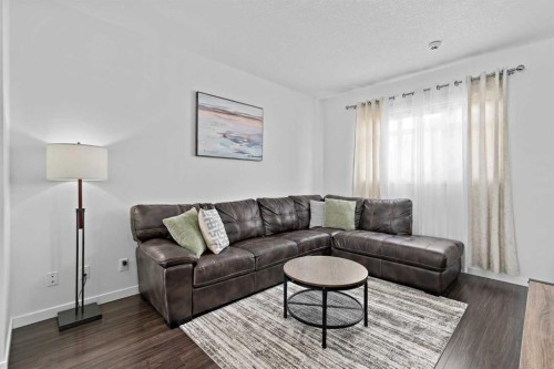 205 Copperstone Park Se, Calgary, AB - Indoor Photo Showing Living Room