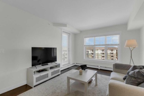 3411-11 Mahogany Row Se, Calgary, AB - Indoor Photo Showing Living Room