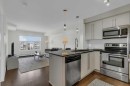 3411-11 Mahogany Row Se, Calgary, AB  - Indoor Photo Showing Kitchen With Stainless Steel Kitchen With Double Sink With Upgraded Kitchen 