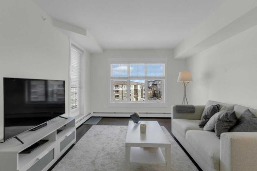 3411-11 Mahogany Row Se, Calgary, AB - Indoor Photo Showing Living Room