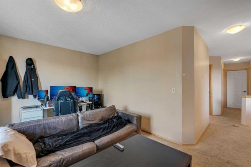 100 Covecreek Close Ne, Calgary, AB - Indoor Photo Showing Other Room