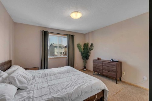 100 Covecreek Close Ne, Calgary, AB - Indoor Photo Showing Bedroom
