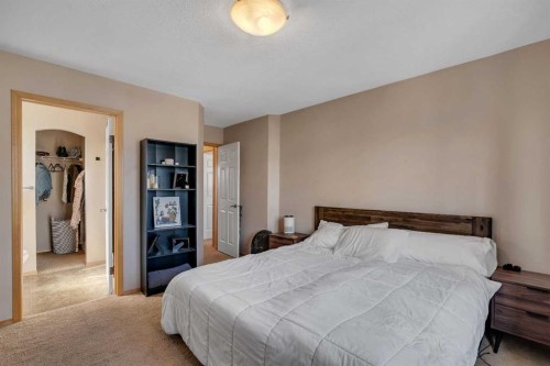 100 Covecreek Close Ne, Calgary, AB - Indoor Photo Showing Bedroom