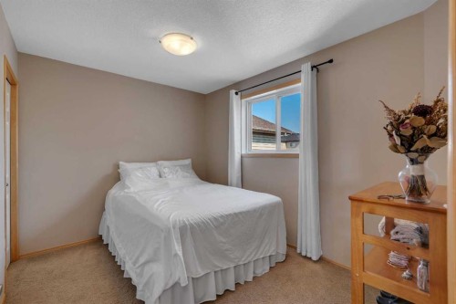 100 Covecreek Close Ne, Calgary, AB - Indoor Photo Showing Bedroom