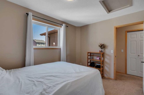 100 Covecreek Close Ne, Calgary, AB - Indoor Photo Showing Bedroom