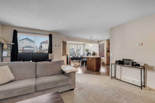 100 Covecreek Close Ne, Calgary, AB - Indoor Photo Showing Living Room