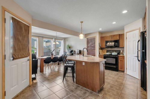 100 Covecreek Close Ne, Calgary, AB - Indoor Photo Showing Kitchen