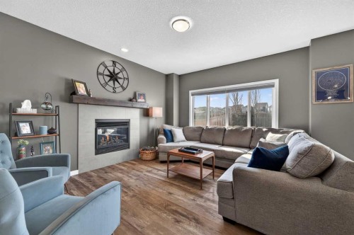 242 Mahogany Passage Se, Calgary, AB - Indoor Photo Showing Living Room With Fireplace