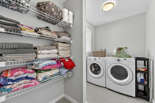 242 Mahogany Passage Se, Calgary, AB - Indoor Photo Showing Laundry Room
